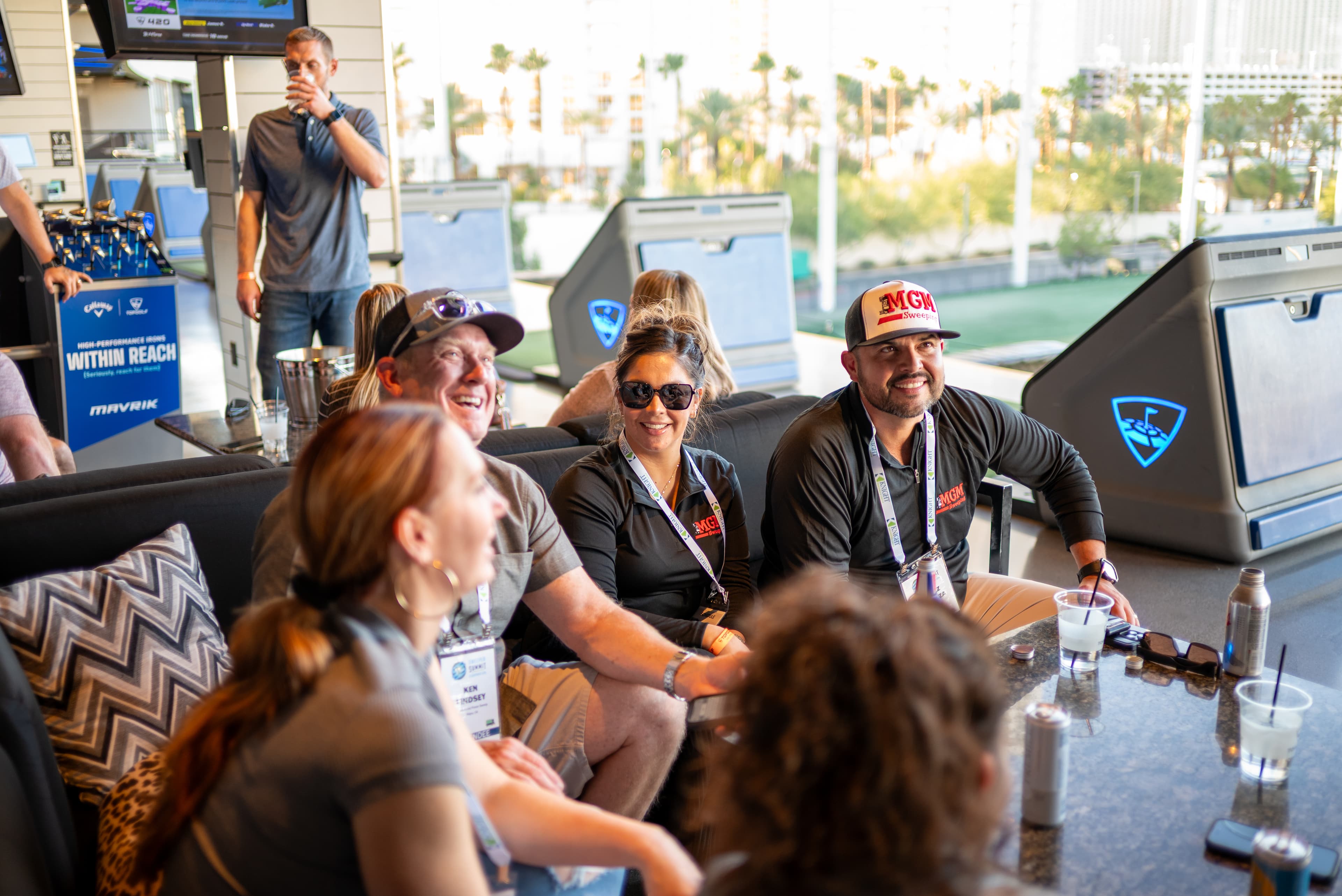 Networking events at Sweeper Summit including cocktails and TopGolf